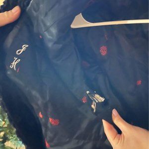 Edmonton Furriers - Vintage Persian lamb Coat with mink trim.